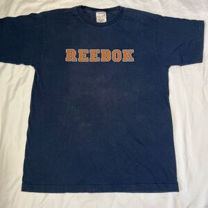 Reebok Dark Blue Tee with Bold Orange Logo